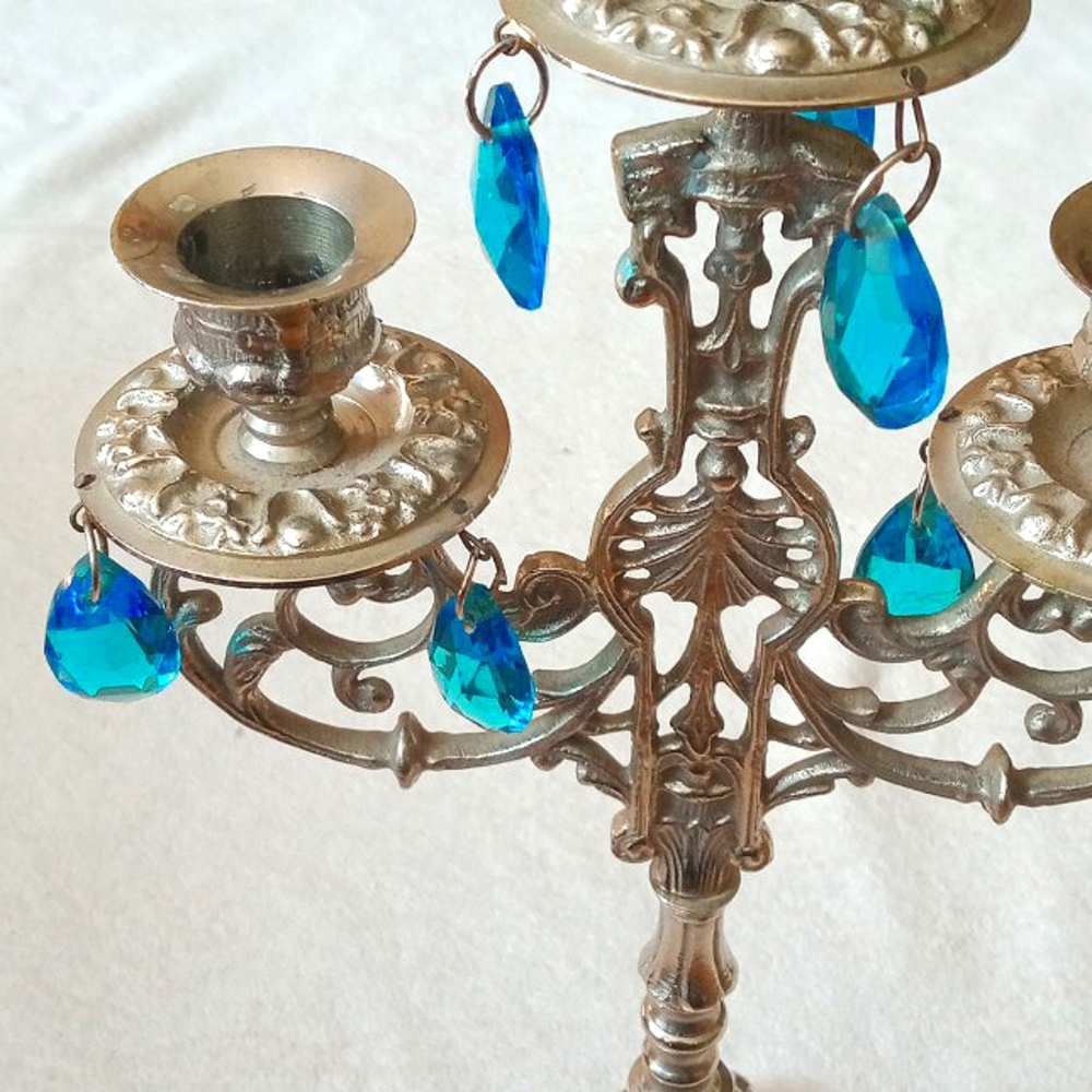 Silver candle holder with blue crystals